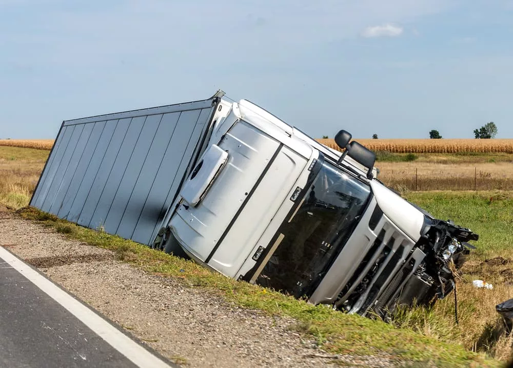 A major truck accident occurred in Miami, FL, causing the truck to overturn into a roadside ditch.